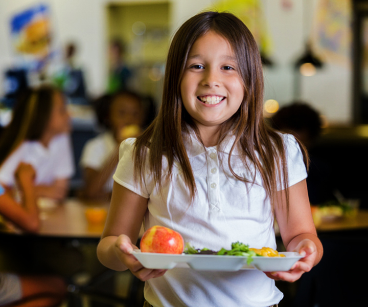 picture of kid with lunch